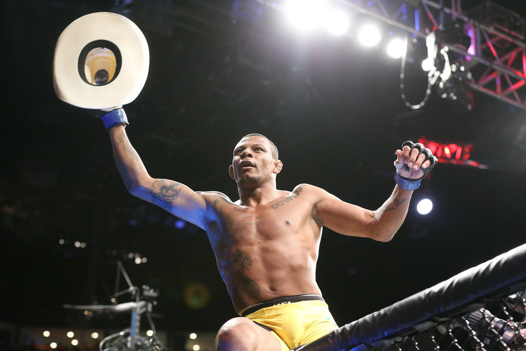 Alex Oliveira celebrates after knocking out Ryan LaFlare