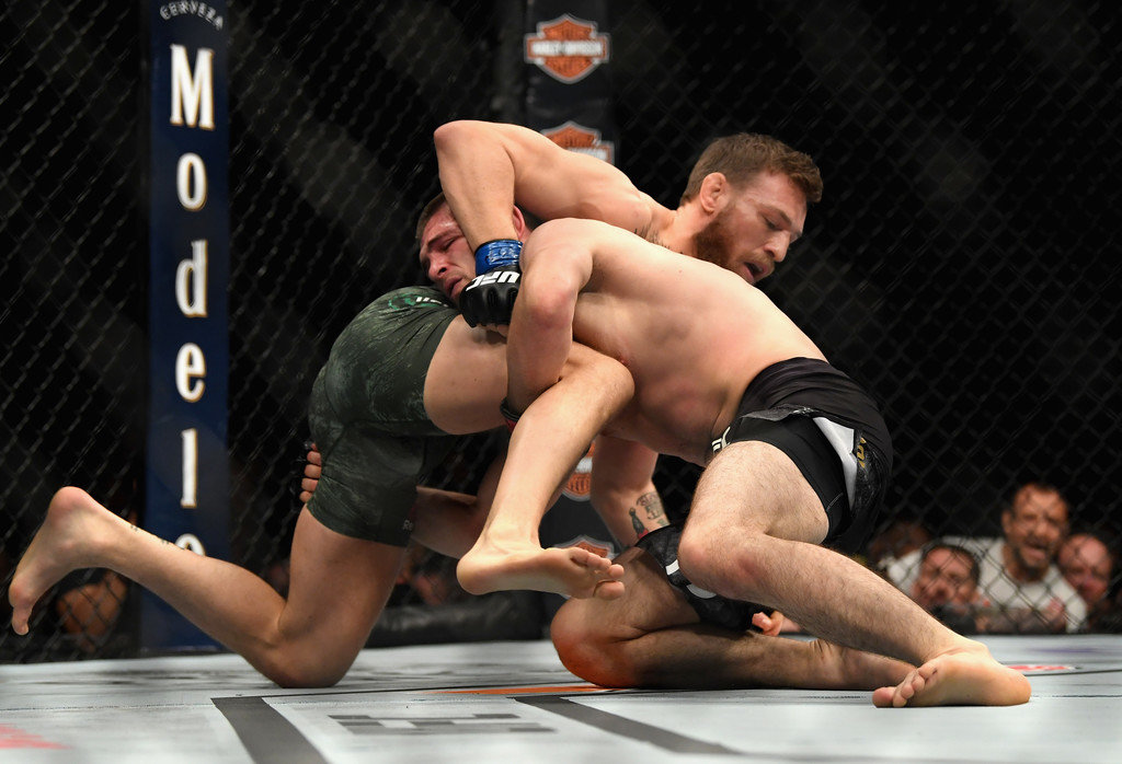 Khabib Nurmagomedov attempts a takedown against Conor McGregor at UFC 229