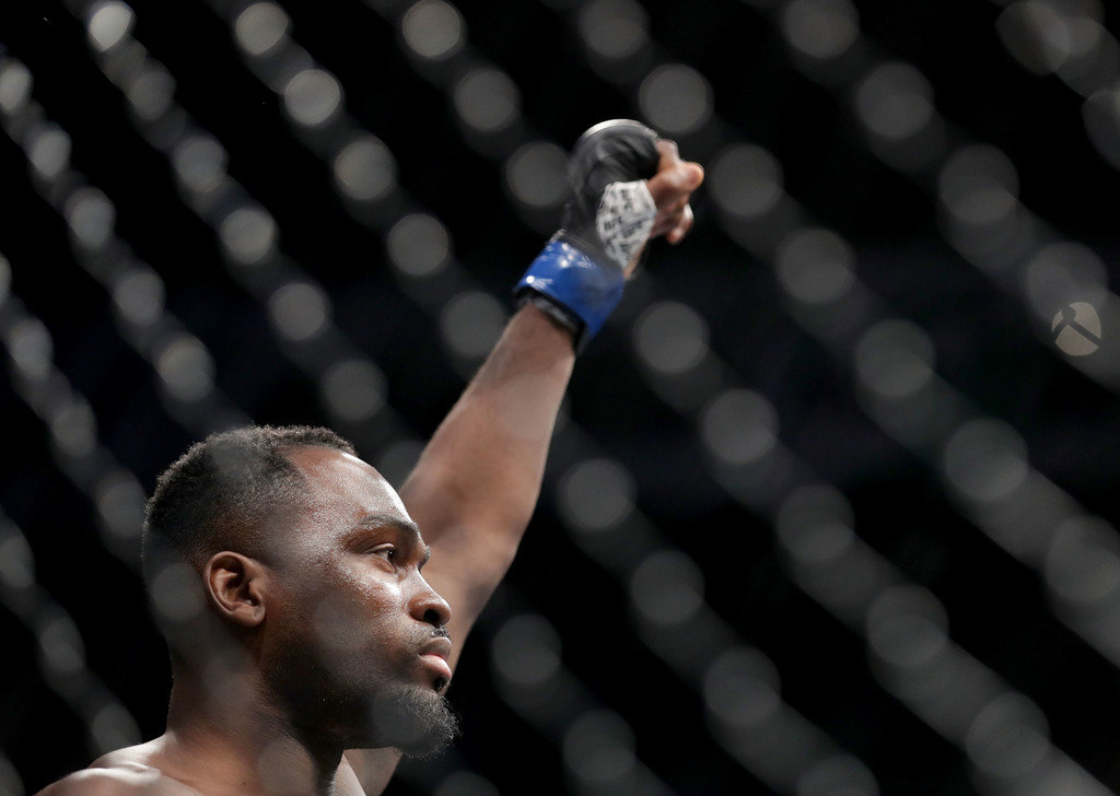 Derek Brunson raises his hand before a UFC Fight Night event