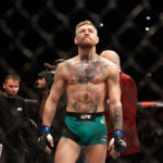Conor McGregor scores a first-round KO victory against Jose Aldo at UFC 194