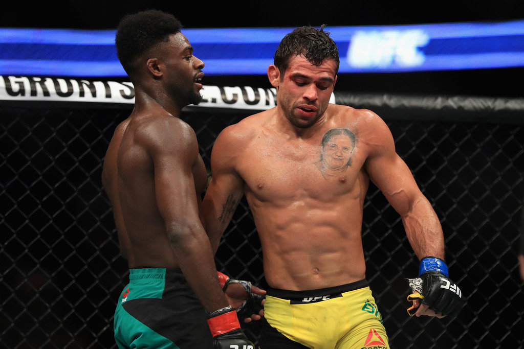 Aljamain Sterling defeats Renan Barao of Brazil during their Bantamweight bout at UFC 214