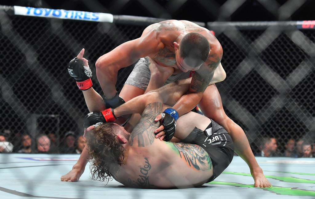 Antony Pettis lands some ground and pound on Michael Chiesa at UFC 226