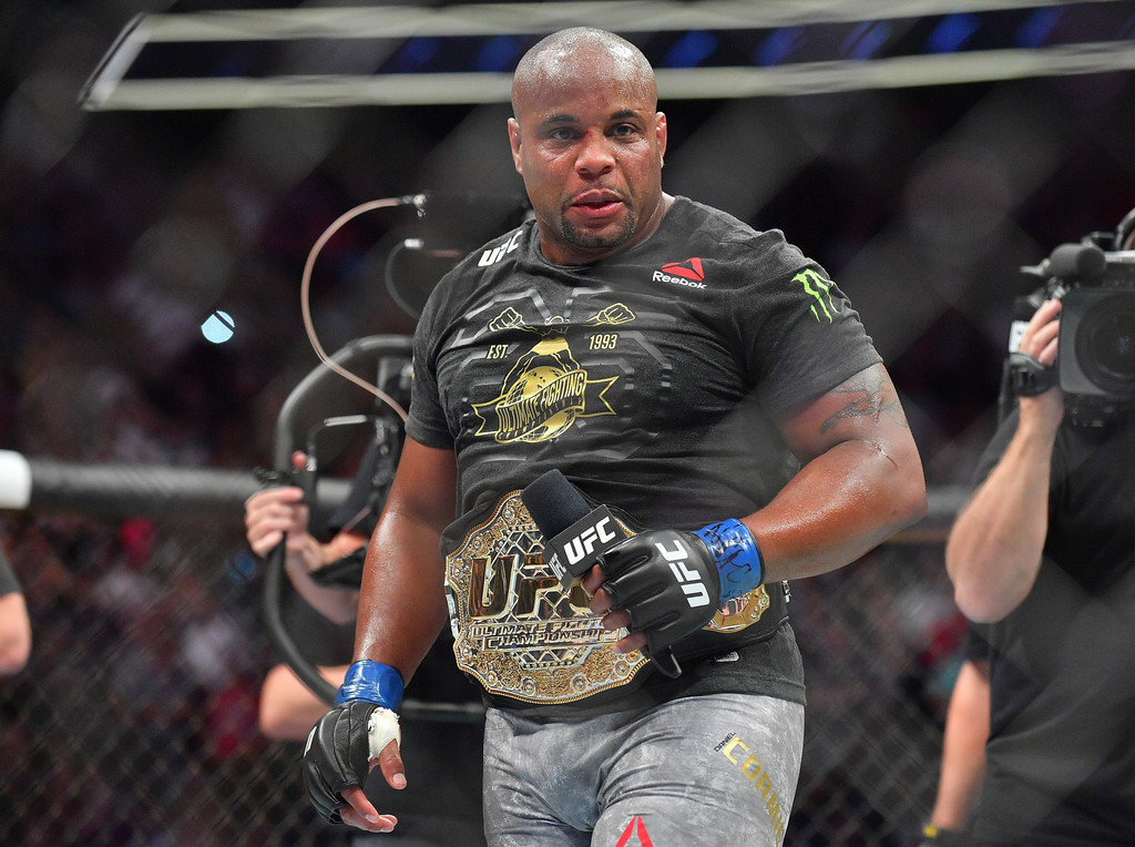 Daniel Cormier addresses the crowd after winning his heavyweight championship fight against Stipe Miocic