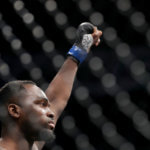 Derek Brunson raises his hand before a UFC Fight Night event
