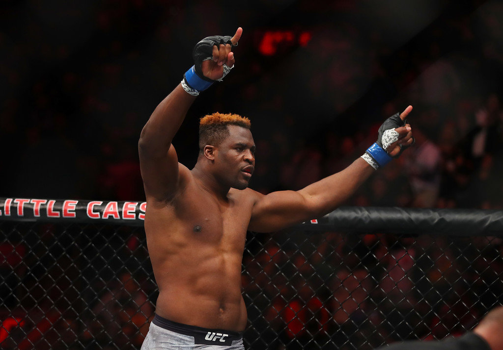 Francis Ngannou celebrate a UFC victory