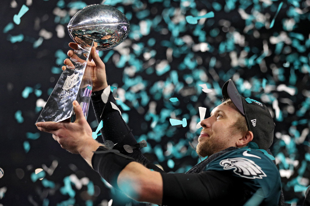 Quarterback Nick Foles #9 of the Philadelphia Eagles raises the Vince Lombardi Trophy