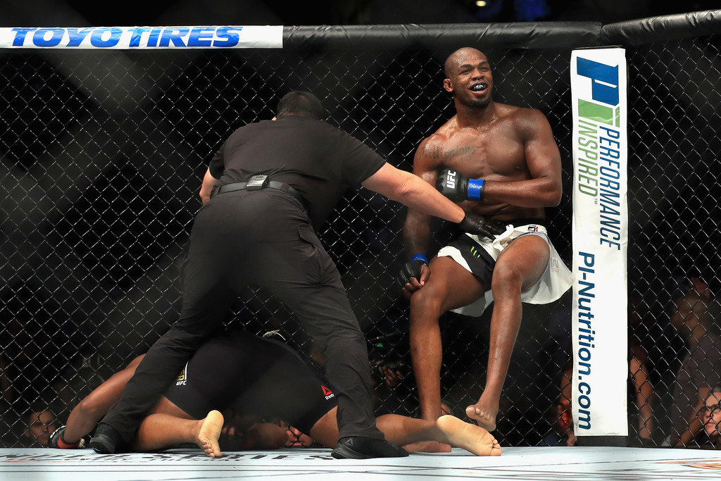 Jon Jones defeats Daniel Cormier in the Light Heavyweight title bout during UFC 214