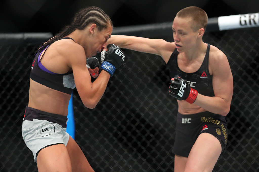 UFC strawweight champion Rose Namajunas (R) throws a right hand at Joanna Jedrzejczyk (L) (Ed Mulholland/Getty Images)