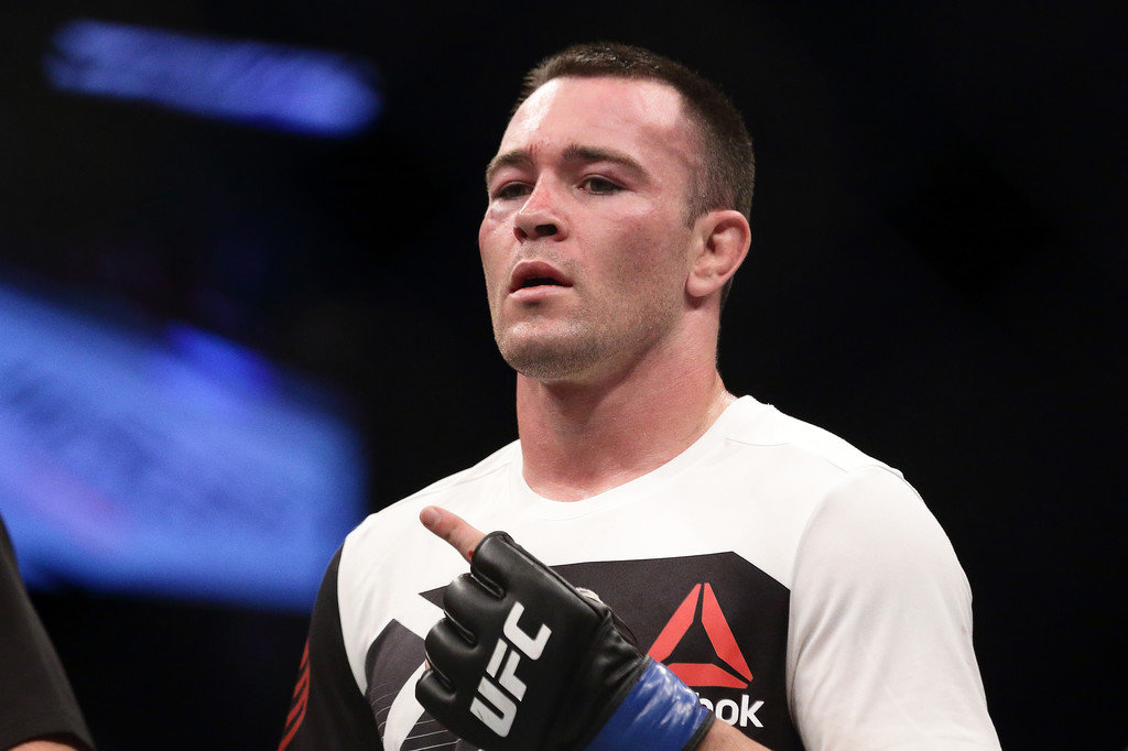 Colby Covington of United States (front) gestures after defeating Dong Hyun Kim