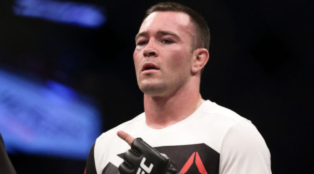 Colby Covington of United States (front) gestures after defeating Dong Hyun Kim