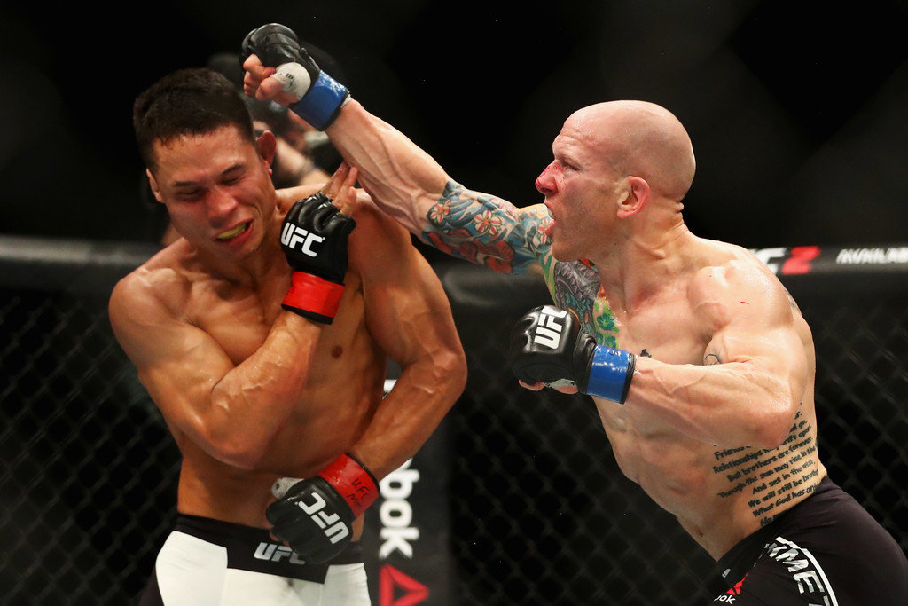 Jon Tuck of the USA and Josh Emmett (R) of the USA compete in their Lightweight bout during the UFC Fight Night 87
