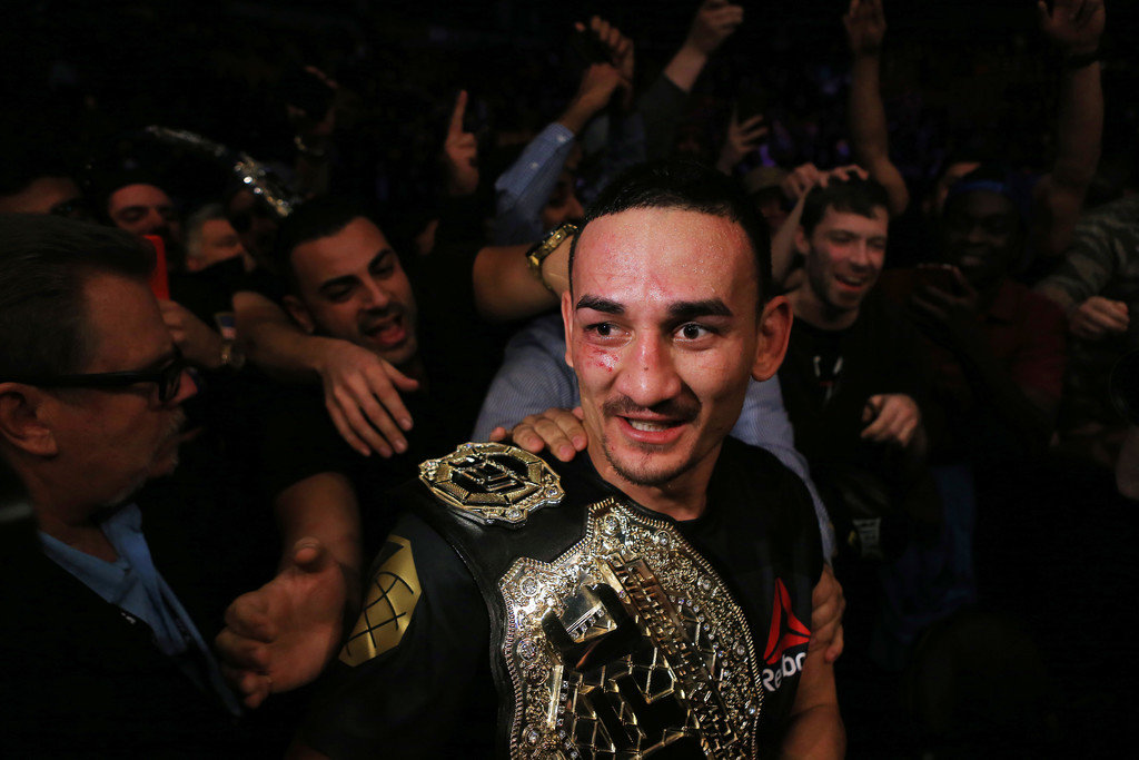 Max Holloway of the United States defeats Anthony Pettis of the United States