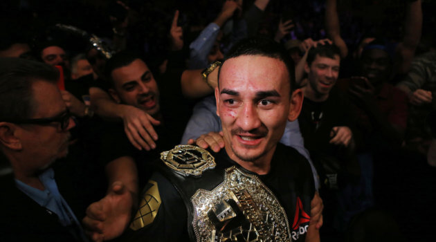Max Holloway of the United States defeats Anthony Pettis of the United States